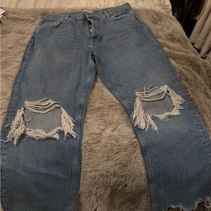 Distressed Blue Denim Jeans